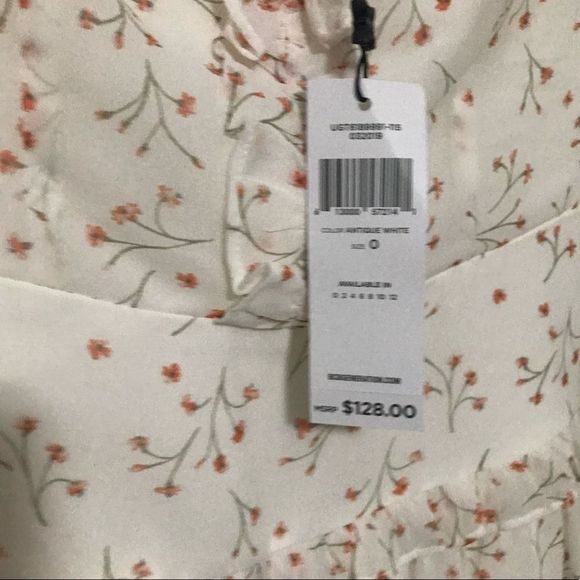 NWT $128 BCBGeneration | Flutter Sleeve | Floral Cutout Dress in Antique White - Picture 9 of 12